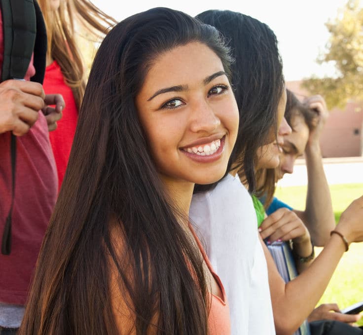 a woman smiling at camera