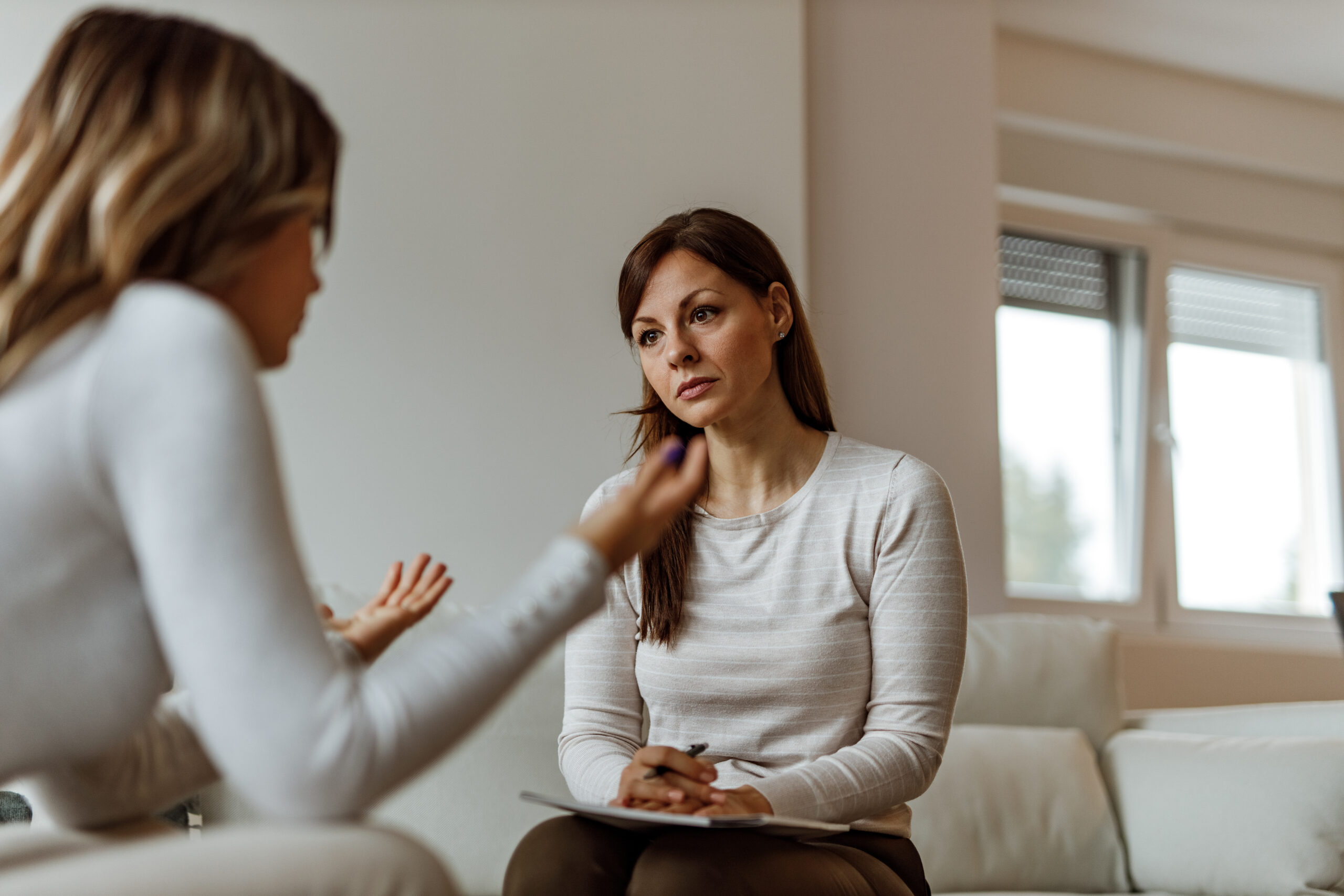 A woman discussing her problems.